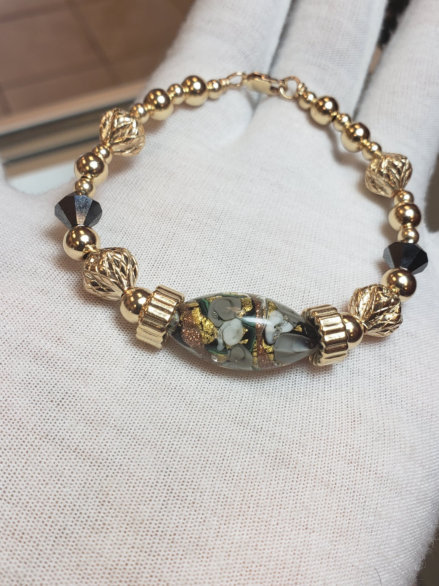 Safari Bracelet on hard gold wire